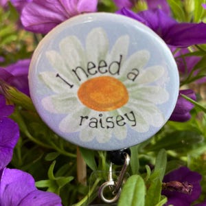Distintivo Raisey Daisy: Distintivo de humor de enfermeira