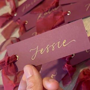 Handwritten Calligraphy Place Cards | Personalised Burgundy Wedding Place Names with Wine Ribbon