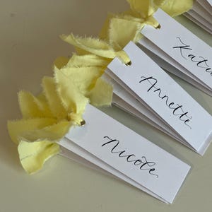 Handwritten Calligraphy Place Cards | Personalised Butter Yellow Wedding Place Names with Ribbon image 1