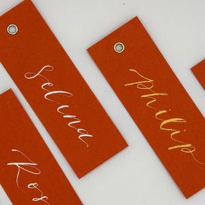 OCHRE Orange Calligraphy Place Name Card | DIY Add Own Ribbon Calligraphy Wedding Place Name Card | Gold or Silver Eyelet Place Card