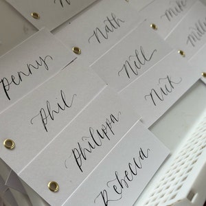 Calligraphy DIY Wedding Place Name Card | White Card with Hand Written Calligraphy, Blank Flat Place Card Gold Eyelet Ribbon Hole