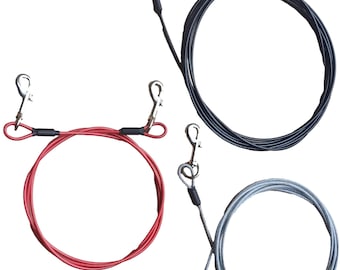 May include: Three dog leashes with metal clips on each end. The leashes are black, red, and silver.