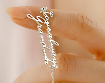 May include: Silver chain bracelet with the words "Forever Always Grandma" written in cursive.