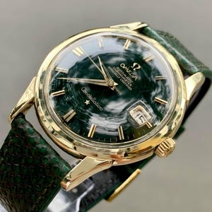 Omega constellation gold watch automatic - Etsy 日本