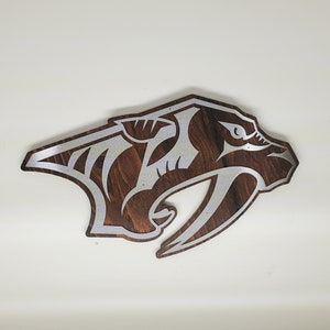What animal inspired the Nashville Predators' logo? 