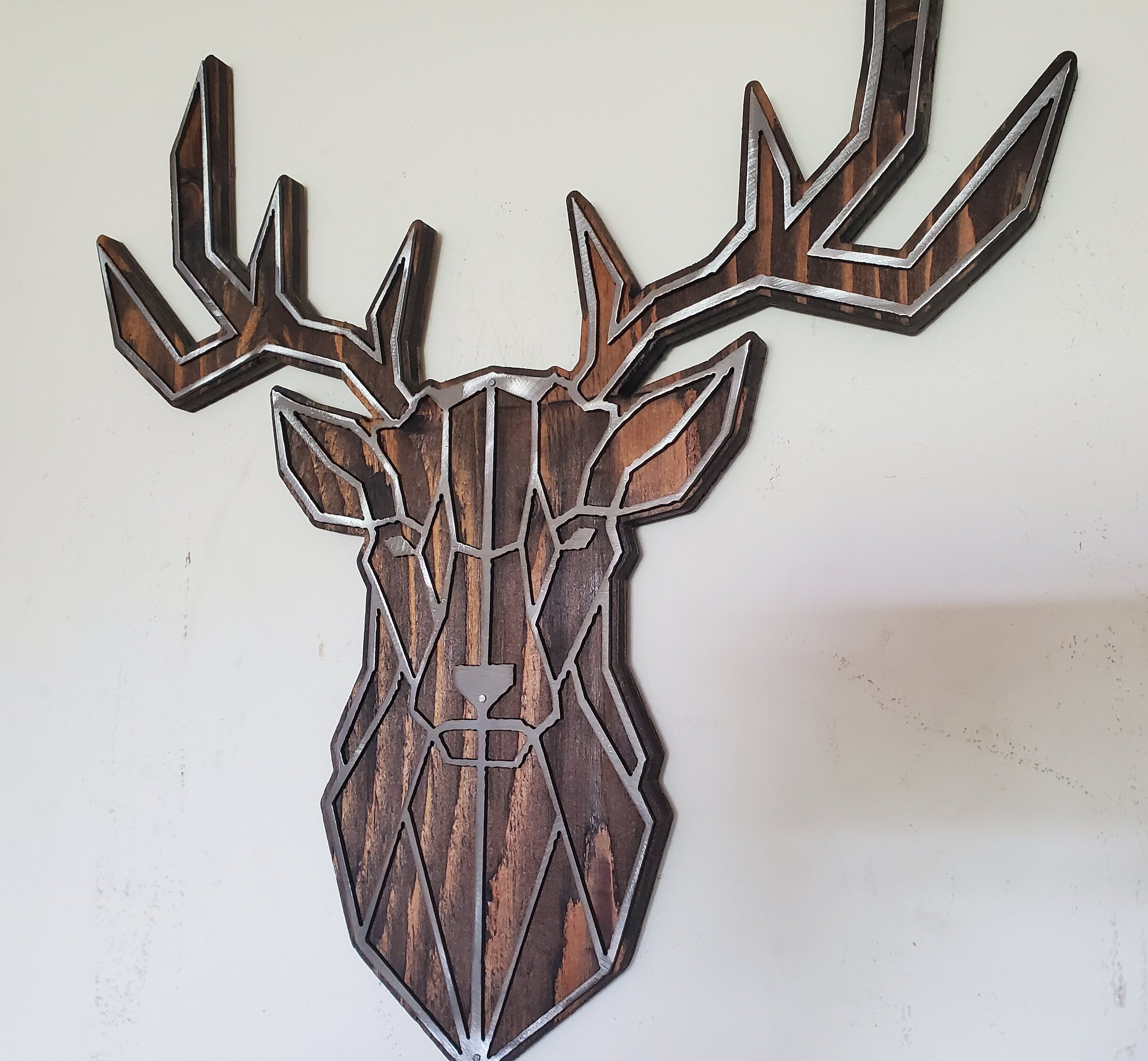 Geometric Buck Head Metal Art on Rustic Stained Wood Whitetail