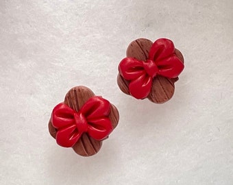 Sementales navideños con lazo rojo / Pendientes navideños rojos pequeños