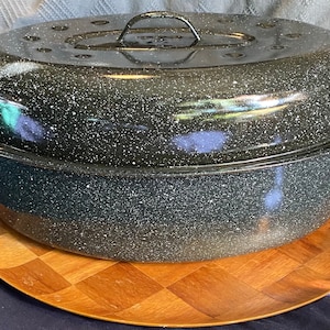 Vintage black & white speckled enamel over steel oval 16 1/2 inch x 12 inch domed cover roaster pan