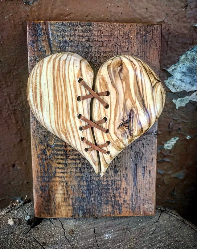 Leather Stitched hand carved olive wood wall decor