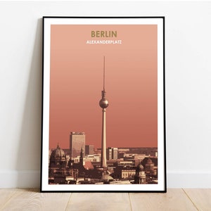 May include: A digital illustration of the Berlin skyline with the iconic Fernsehturm tower in the center. The illustration is in a muted orange color palette with the text "BERLIN ALEXANDERPLATZ" at the top.