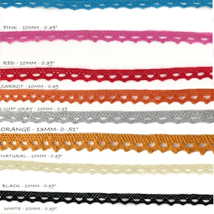 May include: Assortment of 10mm and 13mm wide lace trim in various colors, including green, blue, pink, red, orange, light gray, natural, black, white, and gray. The lace trim features a heart-shaped design.