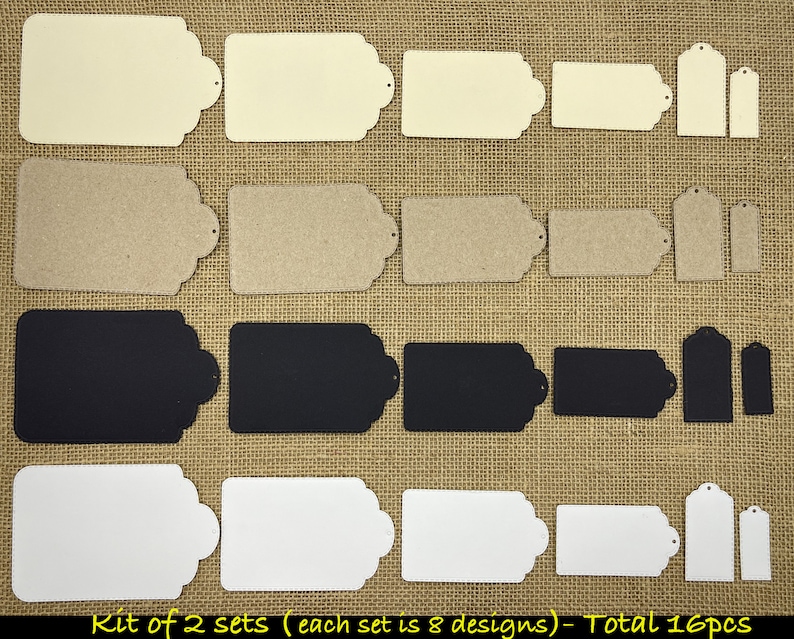 May include: A set of 16 blank gift tags in three colors: cream, black, and white. The tags have a scalloped edge and a hole for string. The tags are arranged in rows on a burlap background.  Kit of 2 sets (each set is 8 designs) - Total 16pcs