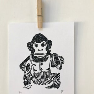 Monkey toy lino print. handmade print.