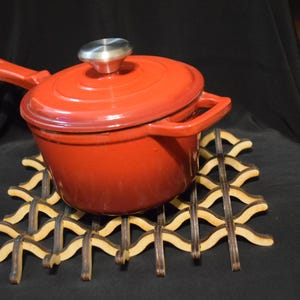 Kleine houten golfonderzetter