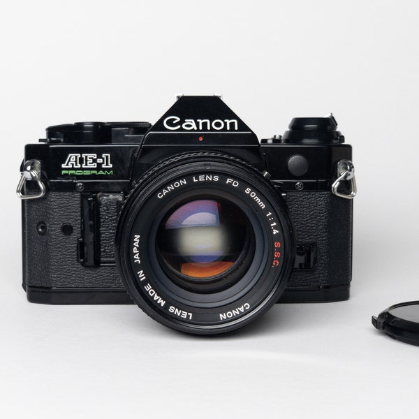 Canon AE-1 PROGRAM film-tested vintage Japanese 35mm Film SLR Camera 1980s — Excellent Condition with f 1:1.4 lens!