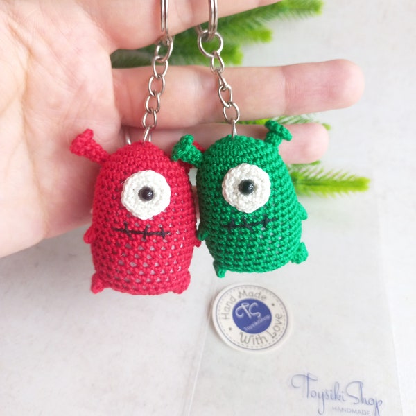 Pocket monster with one eye crochet amigurumi. Сute little keychain for your backpack. Great gift for friend for Halloween or as a keepsake.