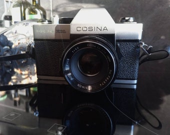 Cosina Hi-Lite film SLR camera body with lens
