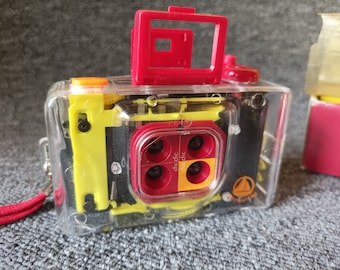 Wegwerp compactfilmcamera met 4 lenzen - verlopen film