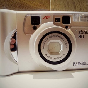 Minolta zoom 80 point and shoot compact body