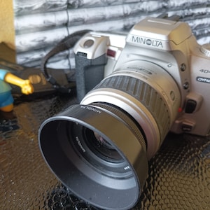 Minolta Dynax 4 SLR film camera body with 28-80 zoom