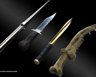 May include: Four fantasy knives with unique designs are displayed against a dark background. The knives include a silver dagger, a serrated blade with a dark handle, a gold-bladed knife with a black grip, and a bone-shaped knife.