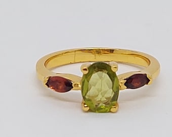 24k Gold Plated over 925 Sterling Silver Peridot/ Garnet Ring. Gold Plated Sterling Silver Peridot Garnet Ring. Genuine gemstone Ring.