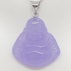 May include: A silver chain necklace with a lavender jade pendant carved in the shape of a smiling Buddha.