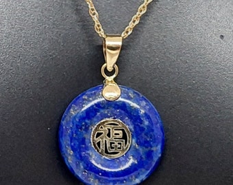 LAPIS Mini Donut LUCK Pendant in 14k Yellow Gold. lapis lazuli 15x15mm with Good Fortune Chinese character in the center. 18' ROPE Chain.