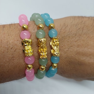 JADE Multi Color stretch Bracelet in Base Metal over Gold Plated Lucky Symbol. 8mm Round Multi Color Jade Bracelet (Pink/Blue/Green)