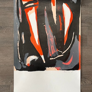 May include: Abstract art print featuring bold black, red, white and grey shapes. The print is signed in the bottom right corner.