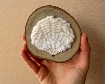 Small white woven Baltic Tellin shell on wood, Textile Art, Embroidery,  Coastal decor