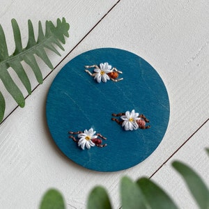 Embroidered sea swimmers on wood wall art image 1