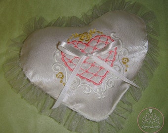 White wedding ring holder pillow with satin ribbon and embroidered heart