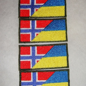 May include: Four embroidered patches featuring the flags of Norway and Ukraine. The flags are sewn together, with the Norwegian flag on the left and the Ukrainian flag on the right. The patches are green, red, white, blue, and yellow.