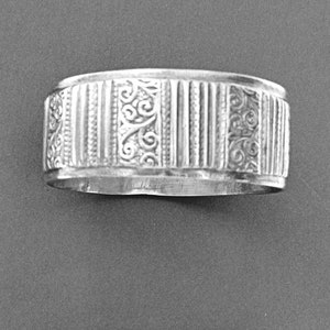Moroccan Berber matched silver chased bracelets