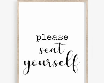 May include: A black and white printable sign with the text "please seat yourself" in a cursive font.