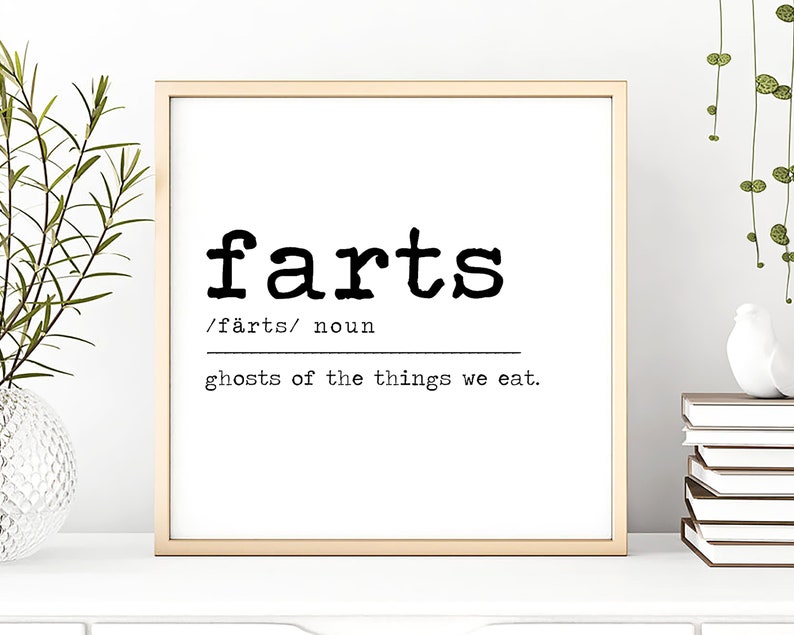 May include: A black and white typography print with the word "farts" in a large font, followed by the phonetic spelling and the definition "ghosts of the things we eat."