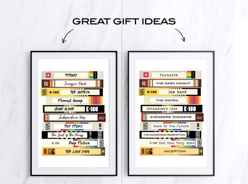 May include: Two framed prints of VHS tapes with movie titles. The left print features titles like Titanic, Jurassic Park, The Matrix, Forrest Gump, Home Alone, Independence Day, Toy Story, The Lord of the Rings, Pulp Fiction, and The Lion King. The right print features titles like Parasite, The Dark Knight, Die Hard, The Matrix, Schindler's List, Avengers: Endgame, Back to the Future, The Shawshank Redemption, Mad Max: Fury Road, and Inception.