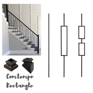 May include: Black metal stair railing with rectangular balusters. The railing is attached to a white wall with a wood staircase. The image also shows two different types of black metal stair post finials.