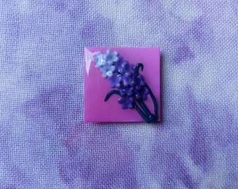 Needleminder Square, purple flowers on pink. Handmade polymer clay.