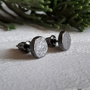 Black sterling silver stud earrings.