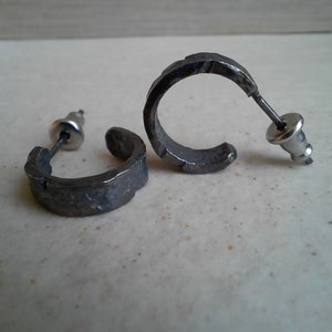 Rough handmade male silver hoop earrings