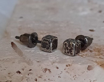 Black silver square stud earrings.