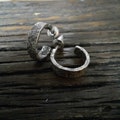Hammered sterling silver hoop earrings. product logo