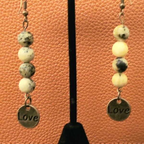 Serpentine earrings with reversible love charm!