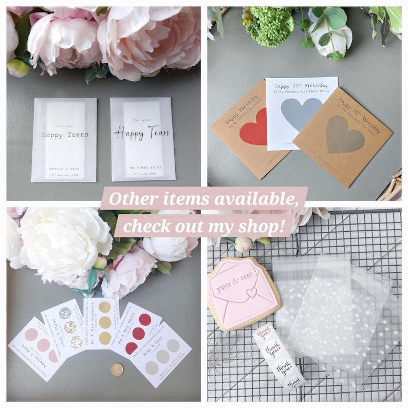 May include: A collection of wedding and event stationery including translucent envelopes labeled Happy Tears, birthday cards with heart scratch-off panels, personalized scratch-off cards with circular icons, a pink envelope-shaped cookie, and polka dot bags.