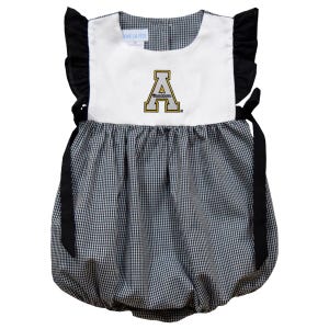 May include: A black and white gingham baby onesie with black ruffle sleeves and black ribbon ties. The onesie has a white panel with a gold embroidered letter "A" and the text "Auburn Tigers".