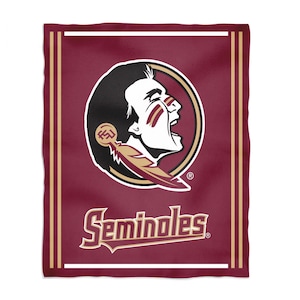 May include: Maroon blanket featuring the Seminoles logo. The logo depicts a Native American profile with war paint, set within a gold-bordered circle. The word "Seminoles" is printed in gold script below the logo. The blanket has a white border.