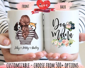 May include: White ceramic mug with a personalized design. The front features a woman with three dogs, with the names Toby, Jenny, and Bailey written below. The back features the text "Dog Mama" with a floral design and a paw print.