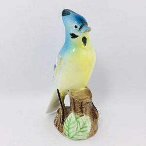 Blue Jay Bird Sitting On A Stump Figurine